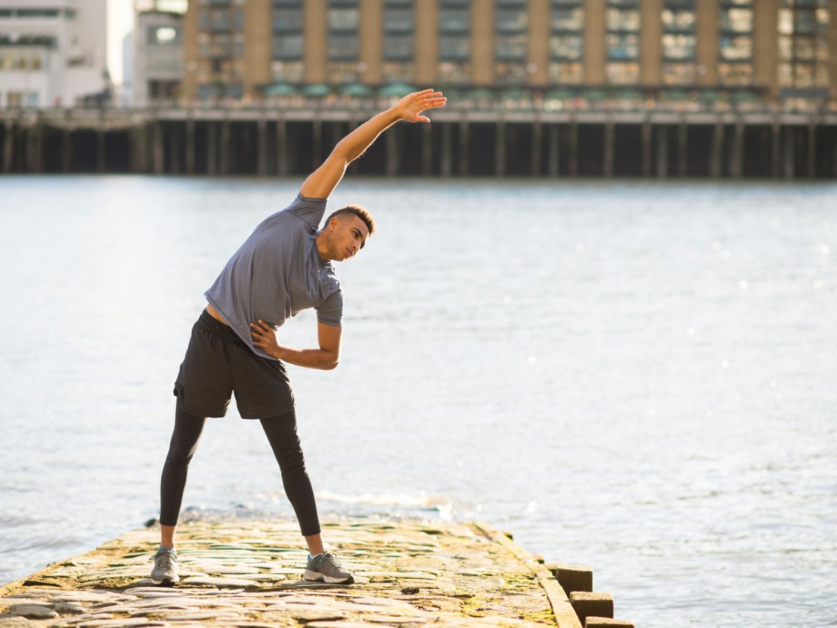 The 10 Best Stretches For Men, According to 10 Trainers